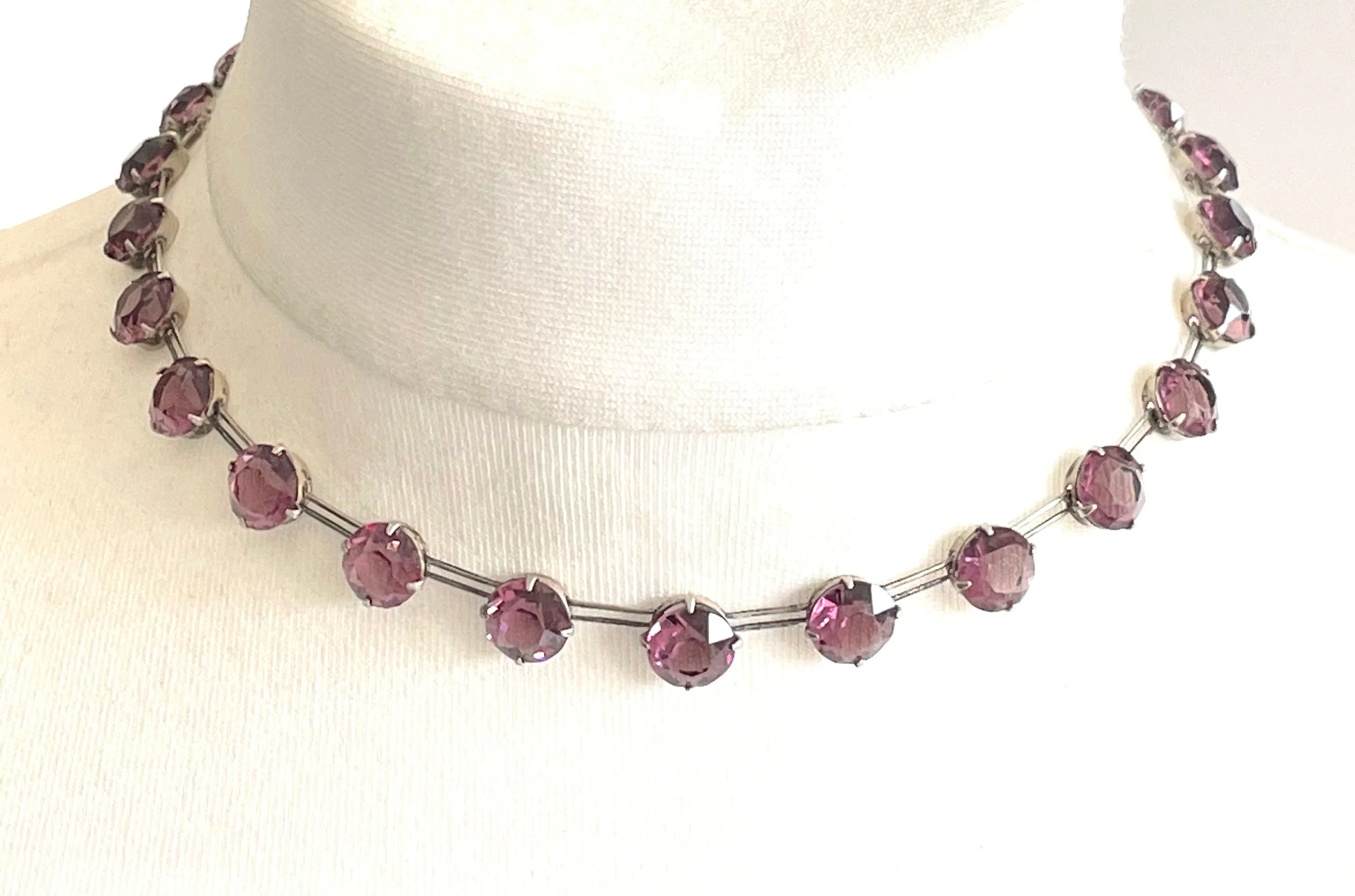 Vintage sterling silver Art Deco ruby pink / amethyst purple chaton cut crystal rhinestone riviere necklace bezel set, open backed, by W H Collins